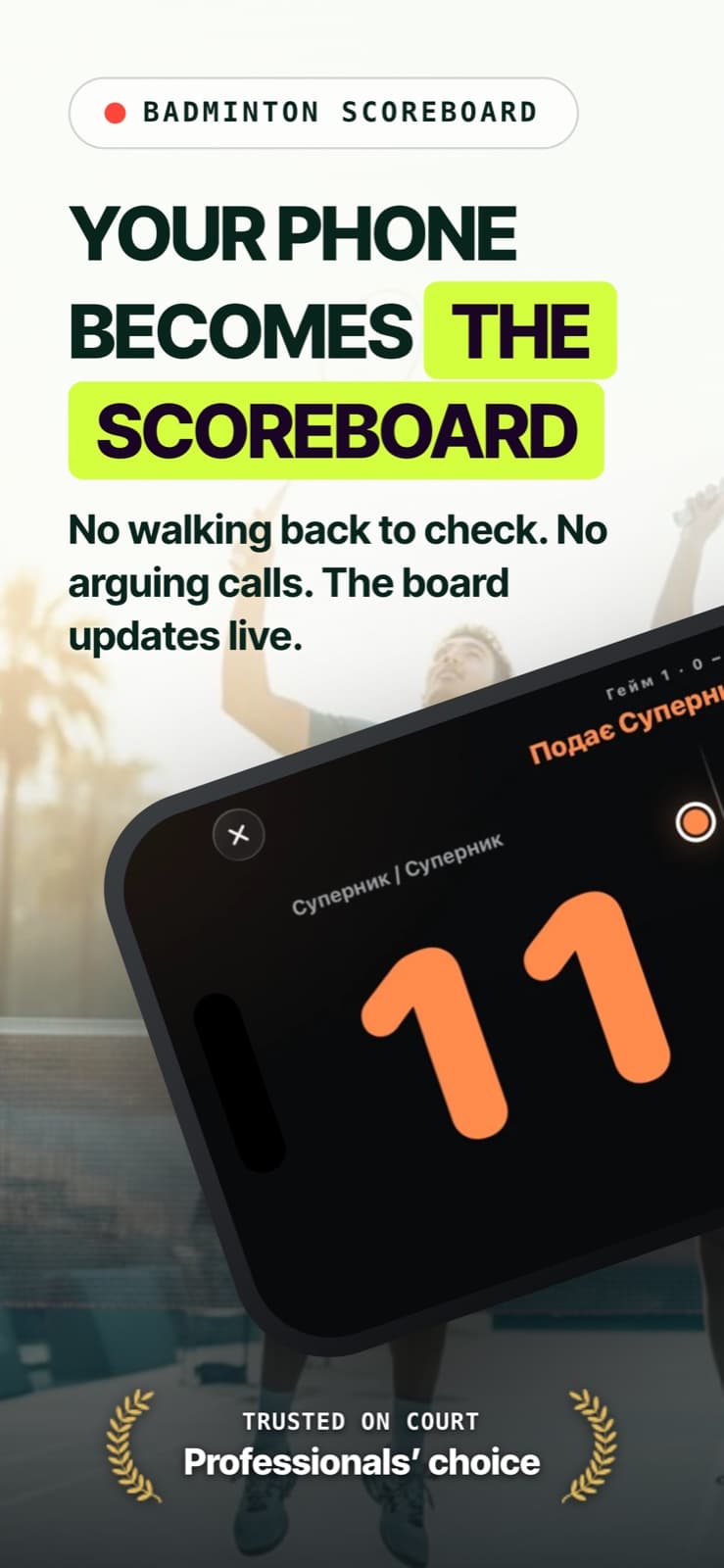 iPhone lying under the net showing a large live scoreboard